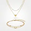 Collar y Pulsera Europeos y Americanos Transfronterizos Set de 2 Piezas de Accesorios, Cadena para Clavícula de Aleación de Perlas en Forma de Corazón de Moda y Elegante para Mujeres