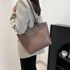 Bolso de mano sencillo de estilo occidental de gran capacidad para mujer, bolso de hombro informal de nueva moda 2025, bolso de hombro ligero.