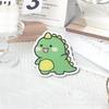 Broche con insignia de acrílico de dinosaurio pequeño de dibujos animados para niños y niñas, lindas joyas pequeñas, se pueden comprar al por mayor para ordenar en el mapa.