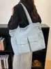 Bolso de lona de mezclilla de gran capacidad para mujer, nuevo modelo 2026, bolso de mano de viaje práctico con múltiples bolsillos, bolso de hombro para el trabajo