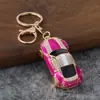 Llavero de coche deportivo con incrustaciones de diamantes en stock, colgante creativo de modelo de coche de esmalte, accesorio para bolso de mujer, artículo promocional