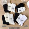 Soporte calcetines de tubo personalizados para dama una variedad de calcetines de felpa de color sólido ins japoneses opcionales fabricantes de calcetines de algodón al por mayor