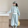 Conjunto Deportivo Casual de Otoño para Niñas 2026 Nuevo Estilo Sudadera con Capucha de Dos Piezas Falsas Pantalones de Pierna Ancha Conjunto de Dos Piezas Estilo Coreano Moderno