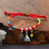Festival del Bote del Dragón zongzi pulsera tejida a mano estilo nacional cuerda roja cuerda colorida aleación conejo pulsera de mano pequeños regalos al por mayor