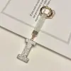 Pingente de chaveiro de carro com 26 letras em inglês cravejado de diamantes transfronteiriço, decoração de bolsa com strass de argila, atacado de chaveiro de celular