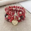 Itens Mais Vendidos Transfronteiriços: Pulseira com Pingente de Coração em Liga de Metal Estilo Boho, Pulseira Elástica de Contas Multicamadas