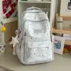 Mochila com acabamento fosco e estampa de estrelas etérea para alunos do ensino fundamental II e médio, fofa e energética, adequada para meninas e estudantes para a escola e passeios