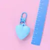 Llavero de corazón de melocotón nuevo color caramelo amor funda protectora aipods funda para auriculares colgante adornos para bolso