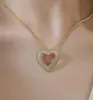 Popular nas redes sociais, best-seller estilo coreano ins moderno minimalista moda europeia e americana conjunto de brincos de tarraxa e pingente com microincrustação em forma de coração