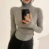 Envío transfronterizo el mismo día Producto coreano genuino Apto para la piel Favorecedor de la figura Estilo delgado Ligeramente transparente Femenina Cuello alto Camiseta interior