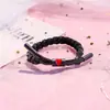 Directo de fábrica Cuerda de mano para acampar ins Red de viento roja con arcoíris holográfico reflectante simple tejido para parejas pequeño regalo al por mayor