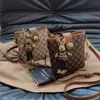 Bolso Cubo Vintage de Gama Alta para Mujer, Bolso de Hombro/Cruzado de Moda y Versátil con Colgante, Nuevo Bolso de Lujo de Nicho 2026
