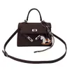 Bolsa de Mão com Pingente Transfronteiriça Outono e Inverno 2025 Nova Moda Tendência Texturizada Simples Versátil Crossbody Bolsa Kelly