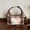 Novo estilo de comércio exterior: padrão xadrez retrô, bolsa de mão temática de gato, moderna e fofa, para mulheres, versátil e estilosa, pode ser carregada sob o braço, na transversal ou no ombro