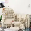 Mochila escolar linda de estilo japonés a cuadros para niñas, mochila de campus moderna versión coreana juego de cinco piezas, al por mayor