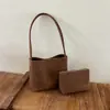 Bolso tipo cubo de gran capacidad transfronterizo para mujer, nuevo modelo 2026, bolso de mano de nicho de lujo ligero de alta gama, bolso de hombro para el trabajo