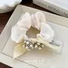 Elástico de Cabelo Elegante com Pérolas e Flores Moda Luxo Leve Artesanato Refinado Acessório para Rabo de Cavalo Coque Venda por Atacado