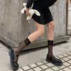 Calcetines de encaje jk para mujer estilo japonés calcetines de moda calcetines largos de rejilla con lazo calcetines finos para pantorrilla lindos al por mayor