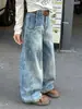 Design patchwork lavado retrô americano, jeans de perna curva para mulheres, estilo de rua, corte solto, efeito emagrecedor, perna larga, calças compridas fluidas, moderno