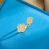 Anillo Abierto de Zirconia de Alta Gama con Forma de Flor de Cuatro Hojas Transfronterizo Ins Anillo para Dedo Índice Lujo Ligero Nicho Temperamento Joyería de Mano al por Mayor