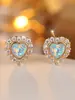 Pendientes de botón de oro rosa de lujo con forma de corazón de ópalo y diamantes, de venta caliente transfronteriza, Pendientes de circonita con forma de corazón de ópalo blanco completamente incrustados de diamantes
