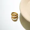 Nuevo anillo geométrico de acero de titanio a la moda, anticaída, para mujer, de nicho, de alta calidad, ligero, de lujo, de acero inoxidable, anillo abierto.