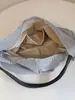 Bolsa de mano a rayas casual estilo coreano Shuai Mi Jia para mujer, modelo nuevo 2026, bolso de hombro de gran capacidad para estudiantes que van a clase