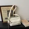 Bolso Pequeño Cuadrado Casual de Moda Ligero para Mujer 2026 Primavera Nuevo Bolso de Hombro Simple para Viaje Bolso Cruzado de Moda