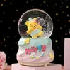 Cartón tarjeta cuero delfín de agua niño bola de cristal brillante caja de música escritorio adornos lindos waterpolo regalos al por mayor