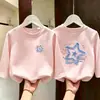 Camiseta de manga larga de algodón puro para niños mayores, nuevo estilo primavera y otoño, top holgado para niñas, camiseta básica de dibujos animados para niñas, moderno