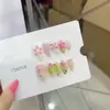 Uñas Artificiales Reutilizables Hechas a Mano Nai Zi Estilo Europeo y Americano B320 Estilo Fresco de Primavera con Base Transparente Nude y Puntas Verdes