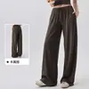 Calça esportiva casual solta para mulheres com bolsos laterais, cintura elástica com cordão, calça longa para fitness, calça larga de treino para Pilates com caimento