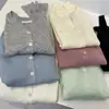 Modelo de Pedido Estilo Coreano 2026 Nueva Llegada, con Lana Fina, Diseño Minimalista de Cuello V Adelgazante, Cardigan de Punto Versátil para Mujer