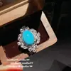 Conjunto de Colar com Pingente de Girassol Azul Turquesa em Formato de Ovo Vintage da Áustria e Brincos de Zircônia Pétala Sotheby's
