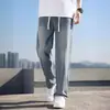 Comercio exterior pantalones de verano sueltos de pierna recta azul claro cintura elástica casual calle alta americana pierna ancha pantalones vaqueros de moda para hombre