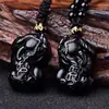 Fabricantes Qin Pei al por mayor material natural obsidiana cabeza grande torcida espalda valiente doble dinero colgante para hombres y mujeres suerte