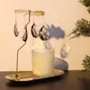 Fabricantes de fuentes, portavelas giratorio magnético pequeño ovalado de acero inoxidable, regalo de Navidad, aromaterapia, linterna romántica