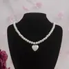 Joyería Transfronteriza Europea y Americana Más Vendida Collar de Perlas de Lujo Ligero Estilo Dulce y Fresco Cadena para Clavícula con Lazo de Cinta Amor