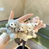 Lindo Lindo Llavero de Peluche de Dibujos Animados de 4 pulgadas Colgante para Bolso Muñeca Pequeña Regalo de Boda