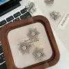 Pinza para el pelo de aleación con forma de copo de nieve, pedrería de perla súper brillante coreana, pinza lateral para mujeres, moda, pinza para flequillo lateral, pinza de pico de pato, horquilla