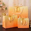 Bolso de Mano Estilo Ins con Degradado Naranja y Decoración de Moño Bolsa de Regalo de Papel Creativa y Hermosa Bolsa para Envolver Regalos