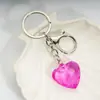 Amazon Transfronterizo Colgante de Llavero de Acrílico Transparente con Forma de Corazón de Cristal Imitación Corazón de Melocotón Colgante para Bolso con Forma de Corazón