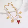 Pulsera de Perlas Estilo Nuevo Retro Europeo y Americano Colgante de Acero Inoxidable Corazón Estrella Joyería de Lujo Ligero de Gama Alta Venta al por Mayor