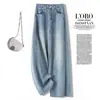Jeans crop de tiro alto de pierna ancha con pedrería de estrellas hechos a medida para mujer, estilo otoño, para figuras petite, con un corte holgado y fluido.