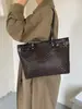 Bolsa de Ombro da Moda Feminina Mais Vendida Transfronteiriça Bolsa Tote Europeia e Americana Mais Vendida Bolsa de Ombro de Grande Capacidade Bolsa de Mão Versátil para o Dia a Dia