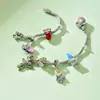 Pulsera de Navidad al por mayor Estilo Punk Metal Frío Europeo y Americano Accesorios de Árbol de Navidad Copo de Nieve Pulsera de Regalo de Nicho para Mujeres