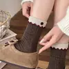 Botão de acessório de acabamento de orelha de madeira meias de botão meias femininas de cano médio Outono Inverno Meia folgada estilo garota japonesa ins sem costura