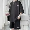 Set de shorts sueltos de manga corta de verano de moda para hombre al por mayor en stock, conjunto deportivo casual suelto de peso pesado estilo Hong Kong