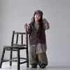 Conjunto de Tres Piezas para Niñas Estilo Coreano Malla Irregular Patchwork Manga Larga Otoño 2026 Ropa Infantil Chaleco de Encaje Pantalones Largos Casuales