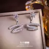 Pendientes de Cinta de Zirconia Aguja de Plata Estrellada Pendientes Franceses de Lujo Ligero de Nicho Bidireccionales Pendientes Exquisitos de Temperamento Socialité